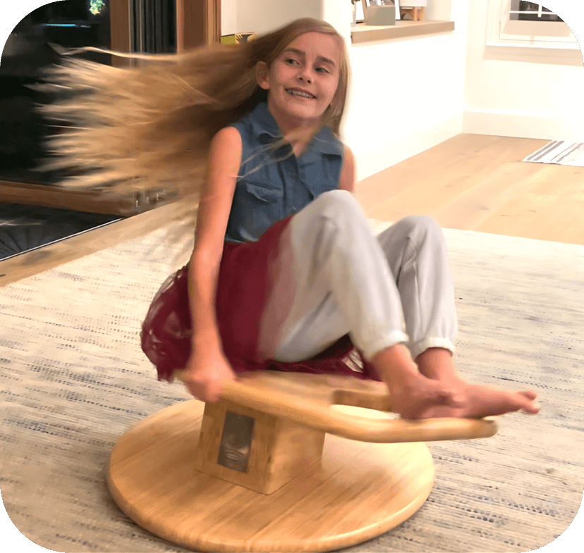 Girl spinning on Whirly•Go•Round